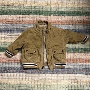 Place size 18 months corduroy bomber, zip close, camel color.